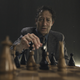 Richard Neil plays two kinds of chess, literal and mental, in Prodigy.